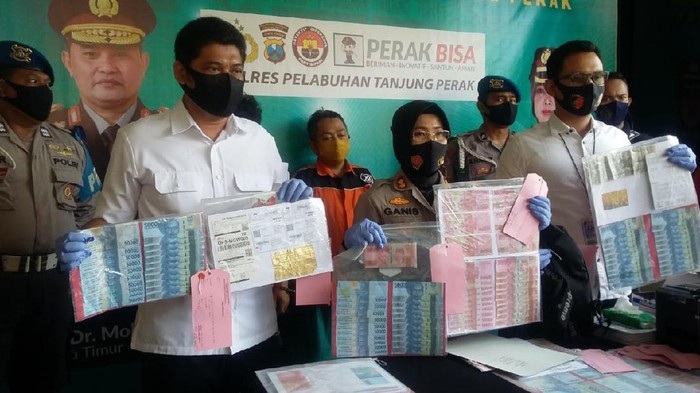Uang Palsu Rp20 Juta Disita, Pembuat-Pengedarnya Ditangkap di Surabaya